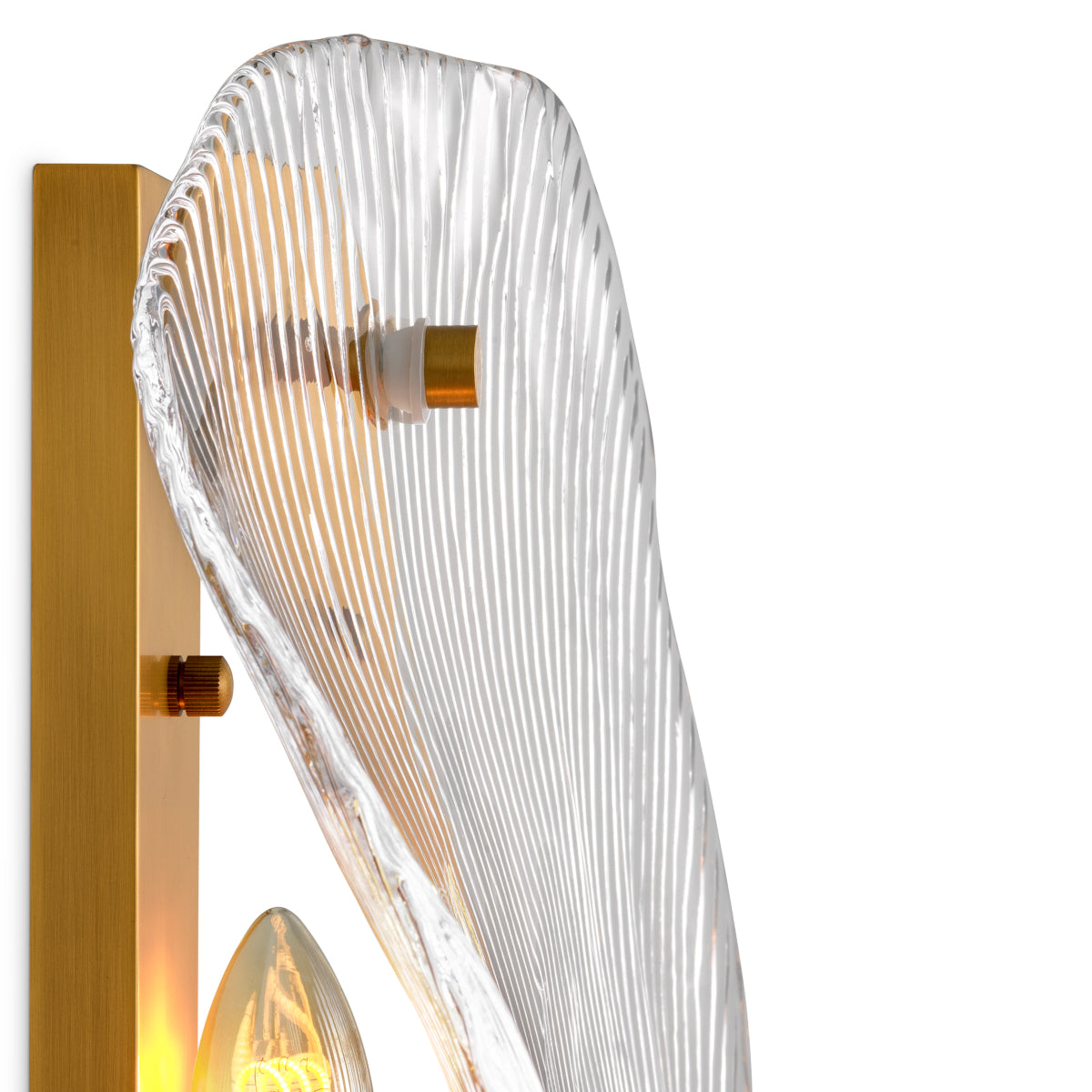 Lampa ścienna Hibis – wykończenie w postarzanym mosiądzu, przezroczyste szkło