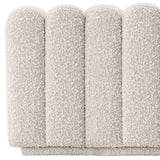 Puf Eichholtz Bente, en tejido Bouclé crema
